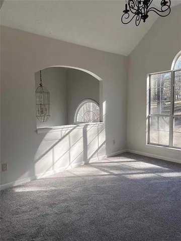a view of empty room with a window