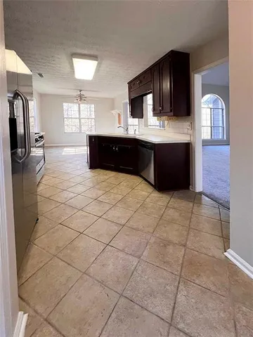 a bathroom with a sink vanity and mirror