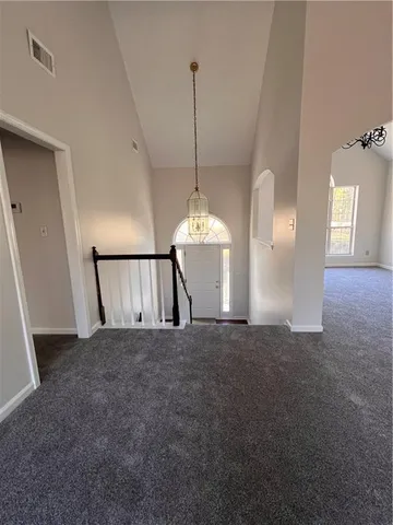 a view of a room with a chandelier