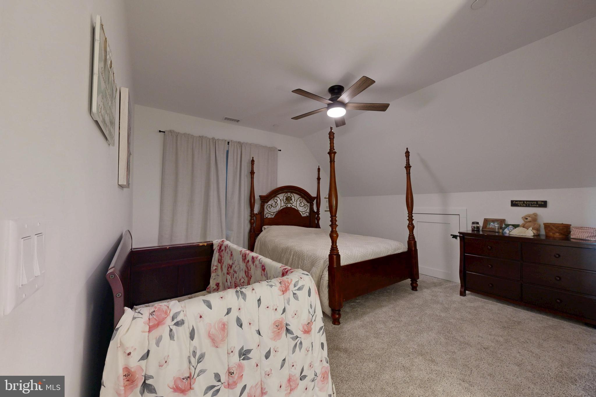 23730 Henry Road Ridgely, MD 21660 - Photo 21 of 28 a bedroom with bed and window