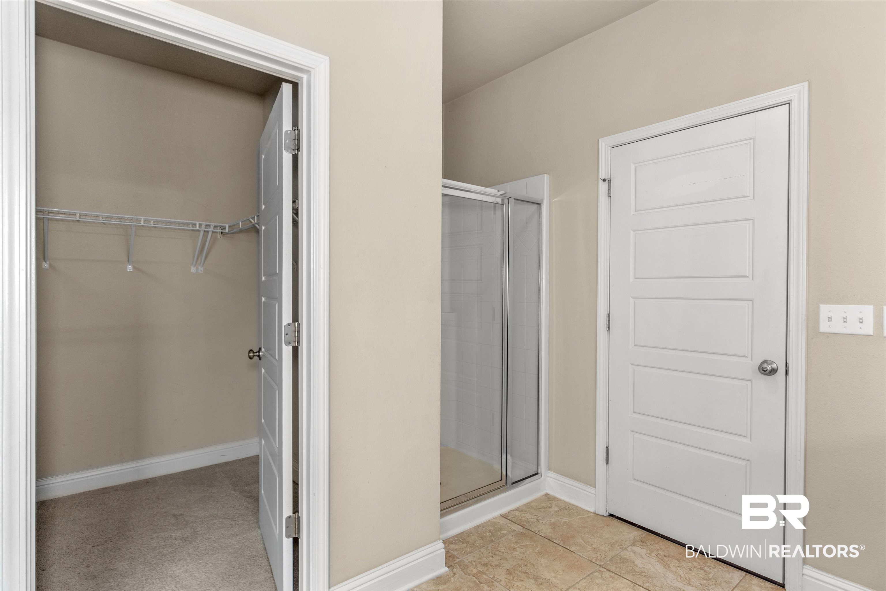 122 Open Field Drive Fairhope, AL 36532 - Photo 14 of 27 Bathroom featuring a shower with shower door and tile patterned flooring
