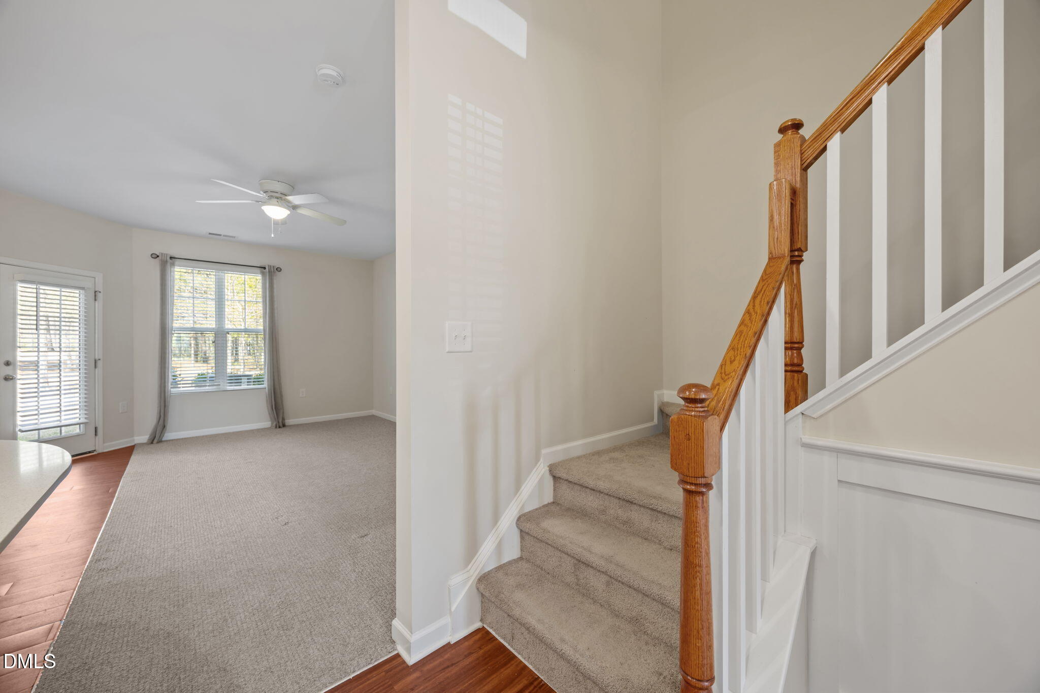 1005 Epiphany Road Morrisville, NC 27560 - Photo 3 of 23 a view of an entryway with wooden floor and stairs