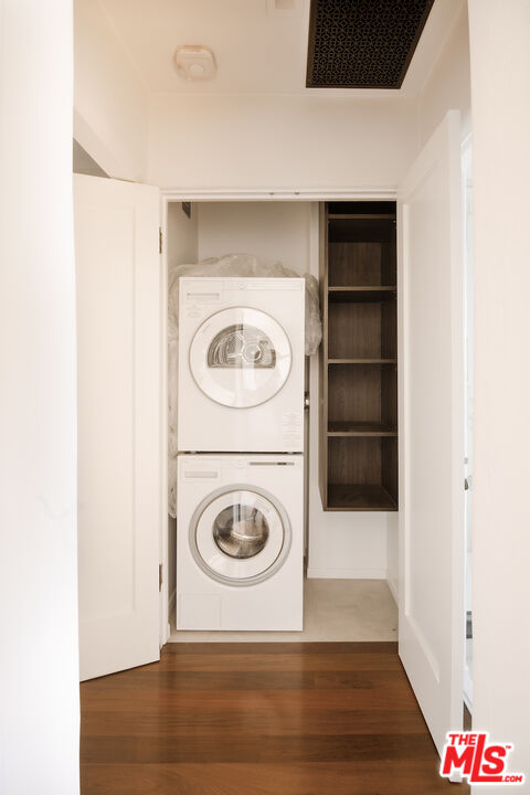 1302 North Sweetzer Avenue, Unit 402 West Hollywood, CA 90069 - Photo 12 of 23 a utility room with dryer and washer