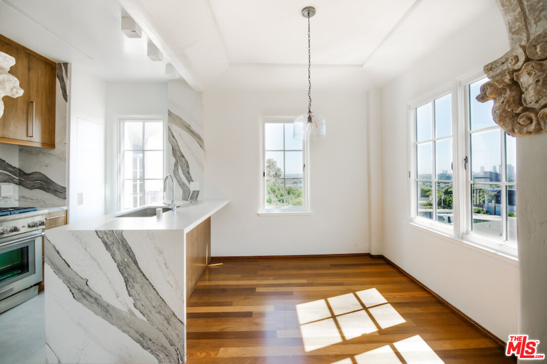 1302 North Sweetzer Avenue, Unit 402 West Hollywood, CA 90069 - Photo 3 of 23 a view of an empty room with a window