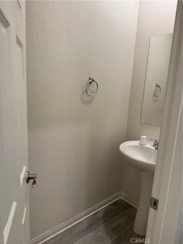 a bathroom with a sink and toilet