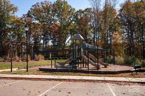 a view of a park with swings