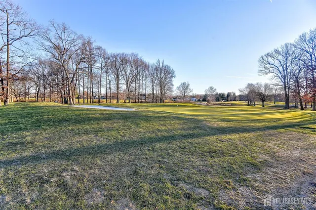 a view of yard with outdoor seating