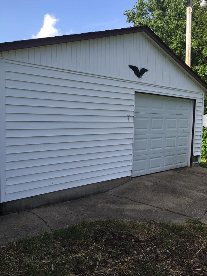 3525 Rossview Road Clarksville, TN 37043 - Photo 9 of 18 a side view of a house with a garage