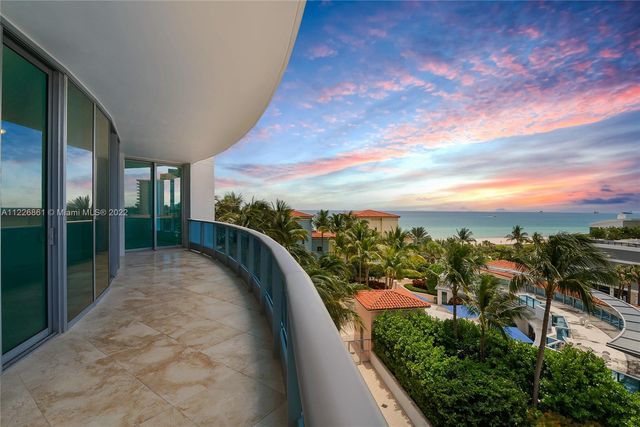 a view of a balcony with an outdoor space