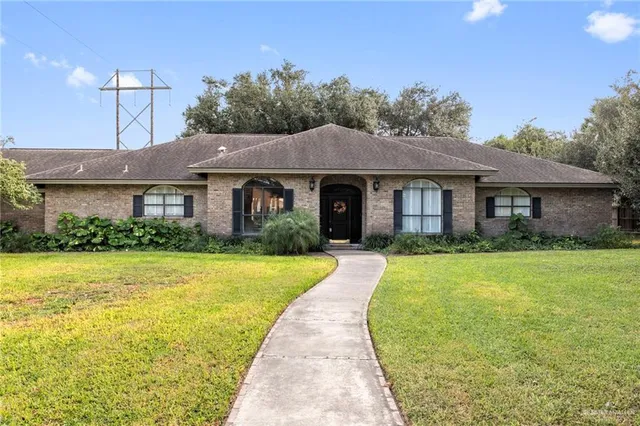 a front view of a house having yard