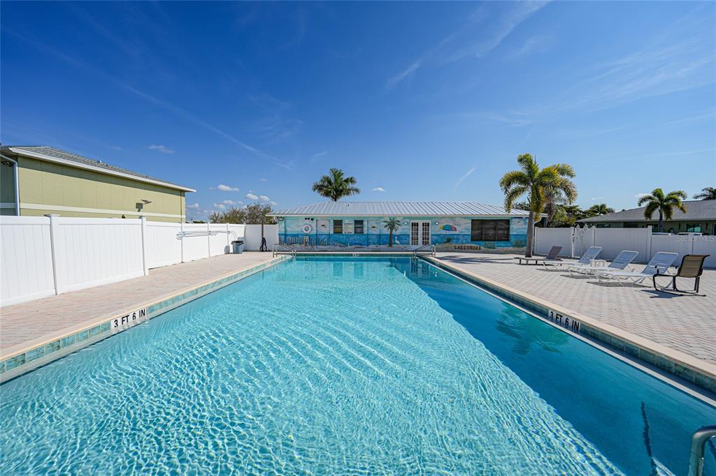 25225 Rampart Boulevard, Unit 1604 Punta Gorda, FL 33983 - Photo 28 of 39 a view of a living room and kitchen