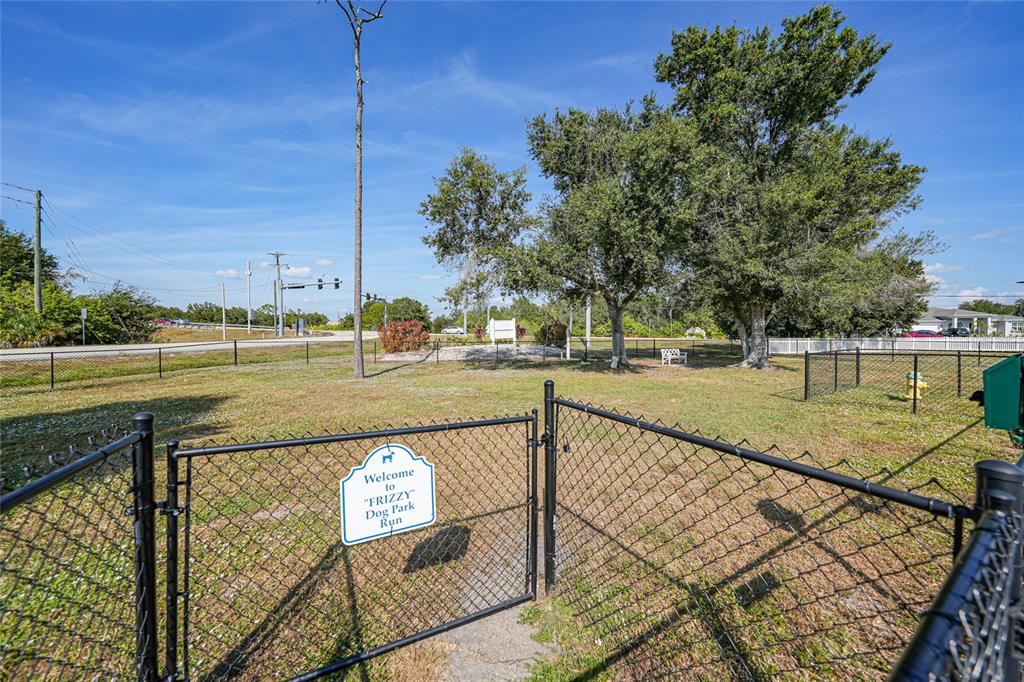 25225 Rampart Boulevard, Unit 1604 Punta Gorda, FL 33983 - Photo 37 of 39 a view of a pathway with a lake view