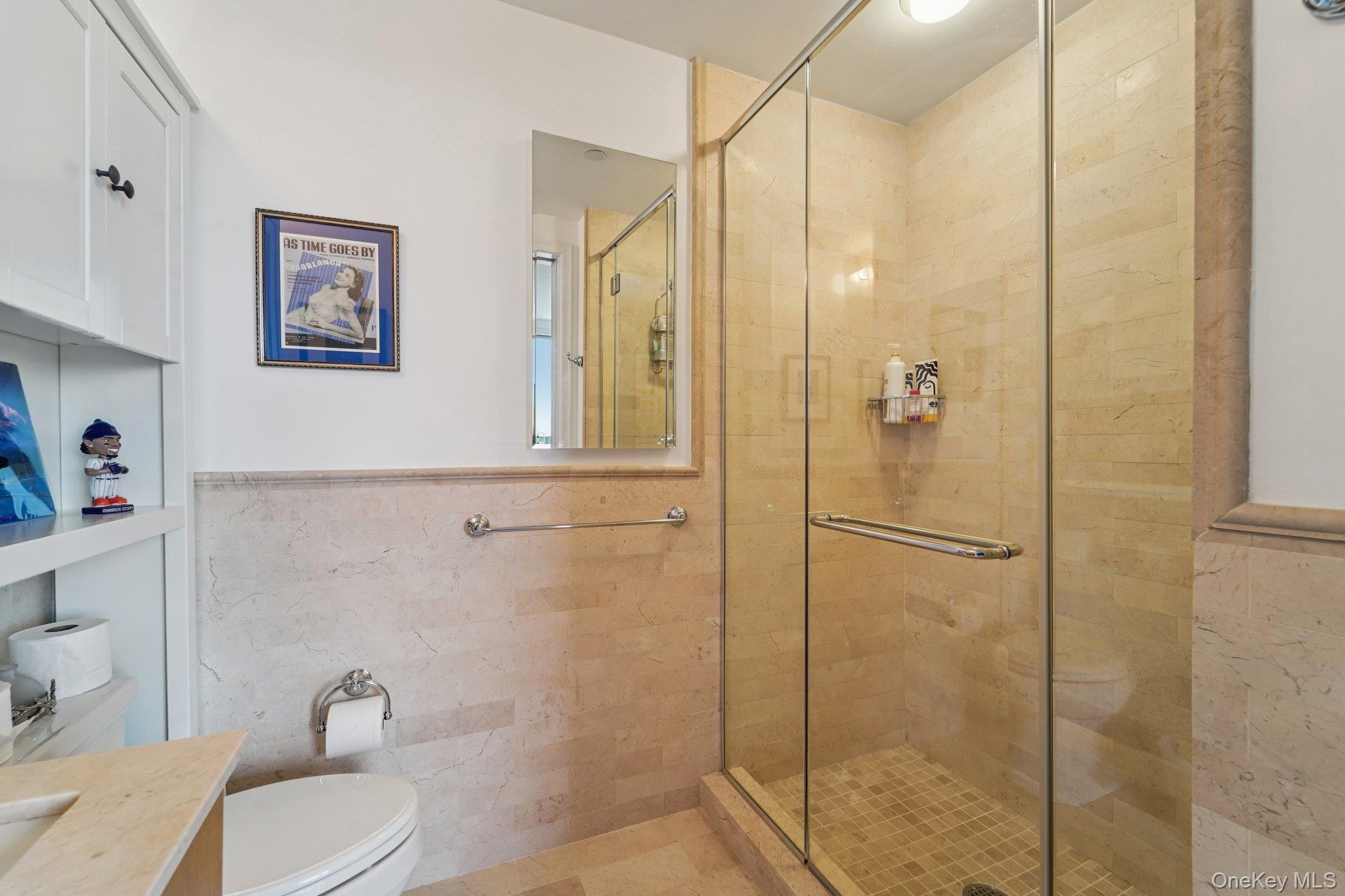 1 Renaissance Square, Unit 25G White Plains, NY 10601 - Photo 18 of 23 a bathroom with a shower and toilet