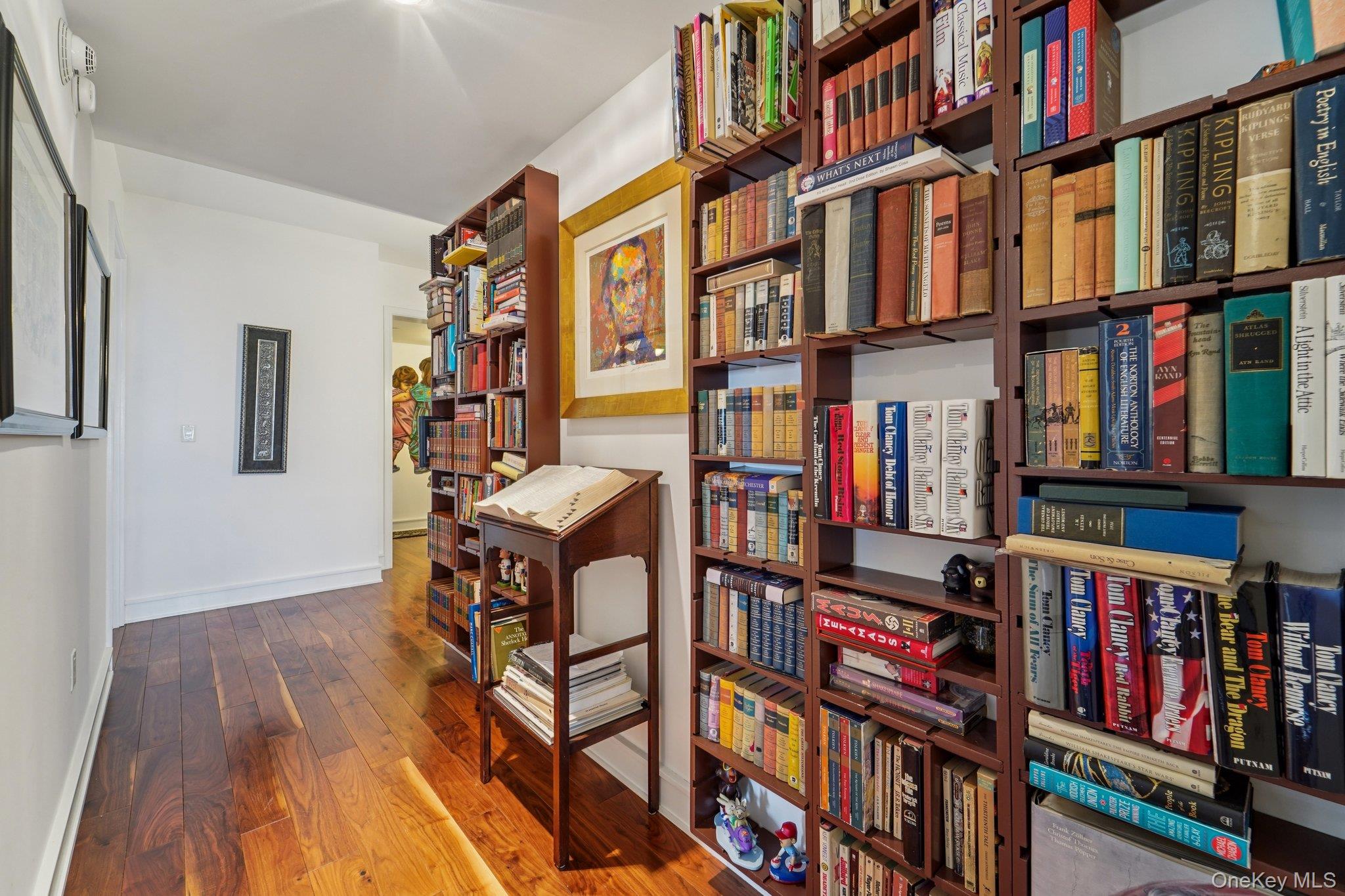 1 Renaissance Square, Unit 25G White Plains, NY 10601 - Photo 7 of 23 a reading room with furniture and book shelf