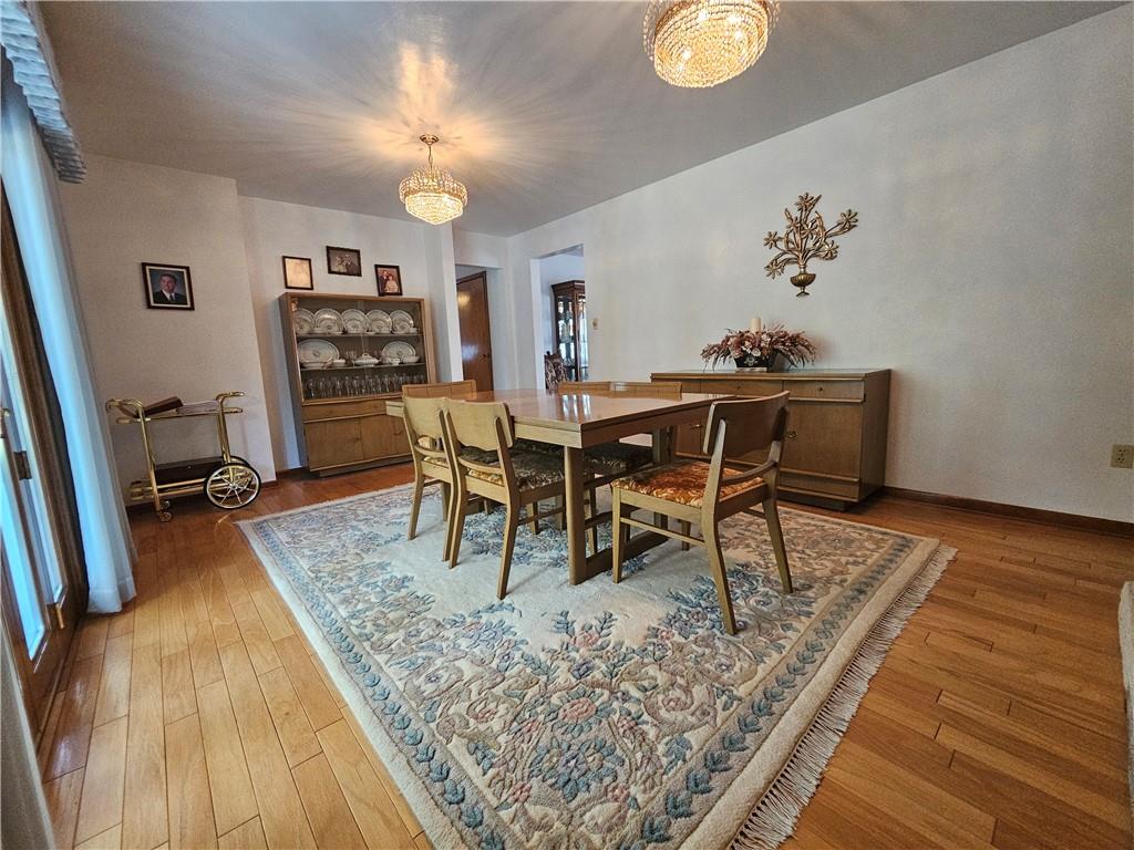 412 Cole Road Sarver, PA 16055 - Photo 16 of 48 a dining room with furniture and wooden floor