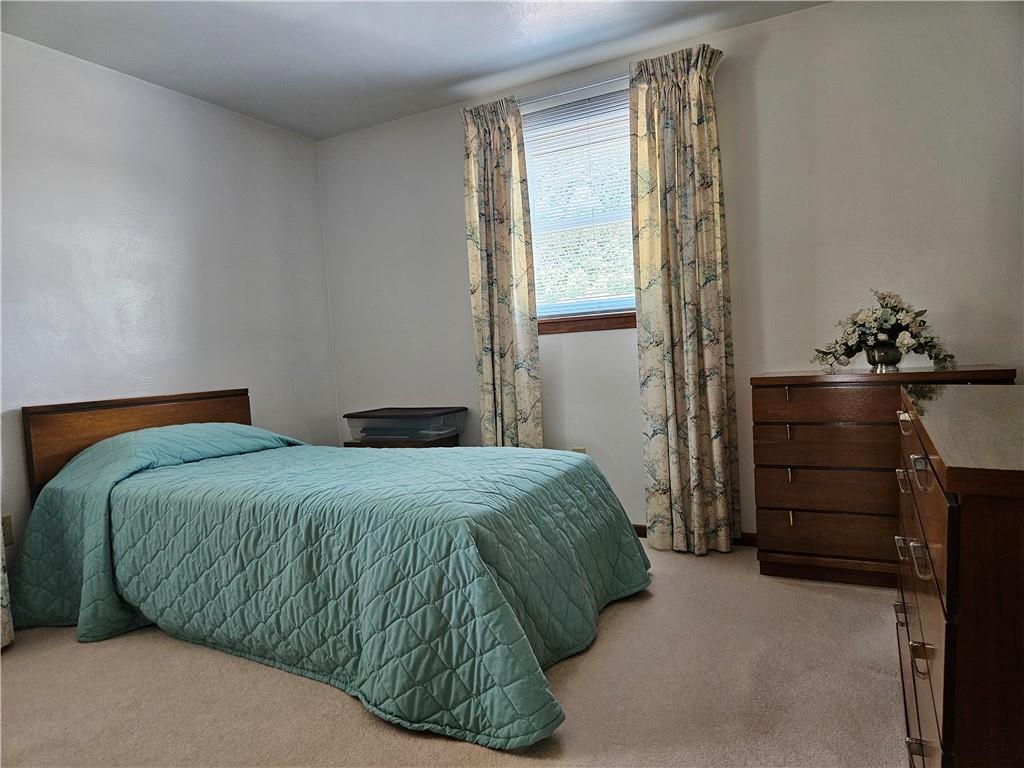 412 Cole Road Sarver, PA 16055 - Photo 25 of 48 a bedroom with a bed and a cabinets
