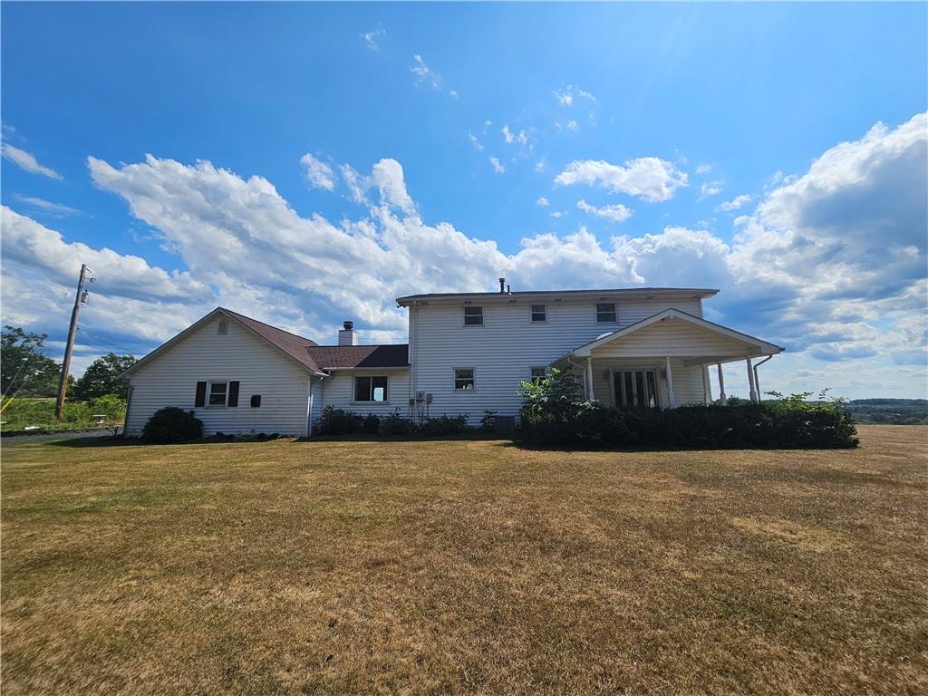 412 Cole Road Sarver, PA 16055 - Photo 3 of 48 a front view of a house with a yard and garage