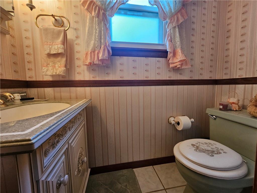 412 Cole Road Sarver, PA 16055 - Photo 33 of 48 a bathroom with a sink a toilet and mirror