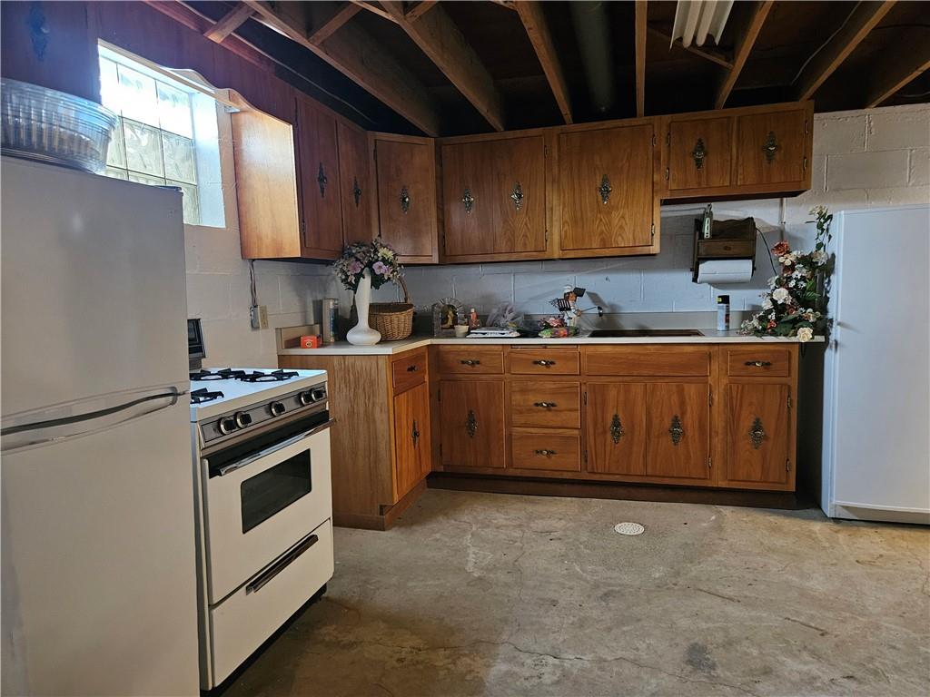 412 Cole Road Sarver, PA 16055 - Photo 38 of 48 a kitchen with stainless steel appliances a stove a sink a refrigerator and cabinets