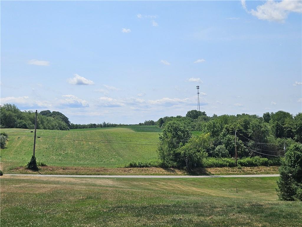 412 Cole Road Sarver, PA 16055 - Photo 40 of 48 a view of a golf course with a lake