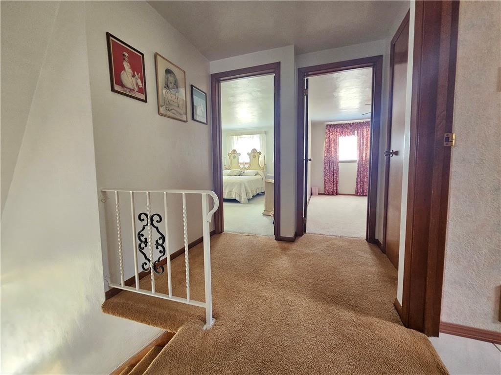 412 Cole Road Sarver, PA 16055 - Photo 44 of 48 a view of a hallway with wooden floor and windows