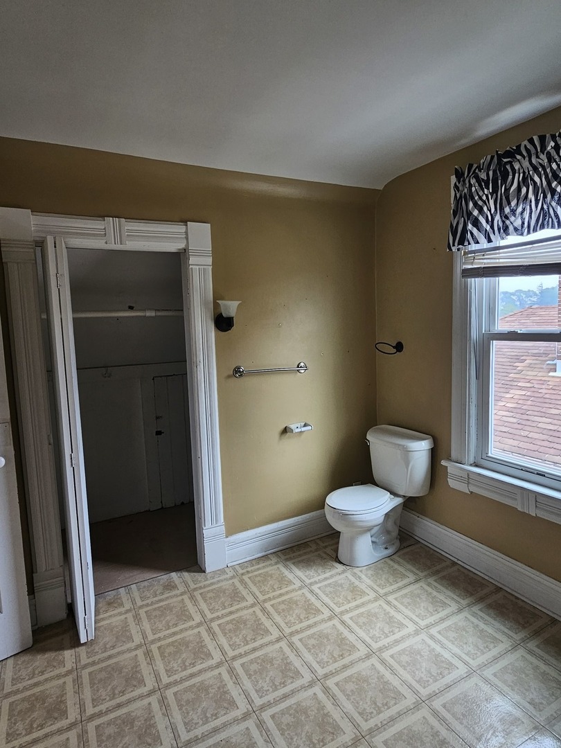 825 Black Road Joliet, IL 60435 - Photo 16 of 22 a bathroom with a toilet