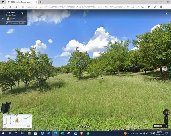 a view of a lake from a yard