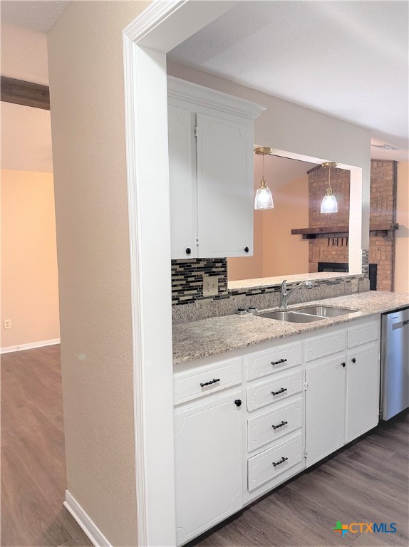 2204 Phyllis Drive Copperas Cove, TX 76522 - Photo 5 of 12 a bathroom with a granite countertop sink and a mirror