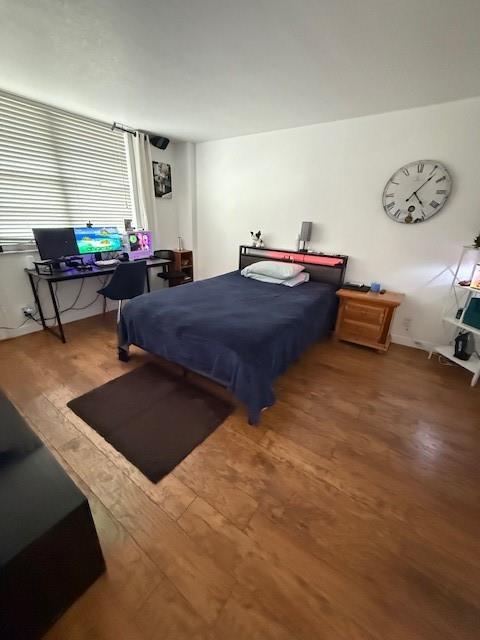 1900 South Ocean Boulevard, Unit 4H Pompano Beach, FL 33062 - Photo 12 of 35 a bedroom with bed and window