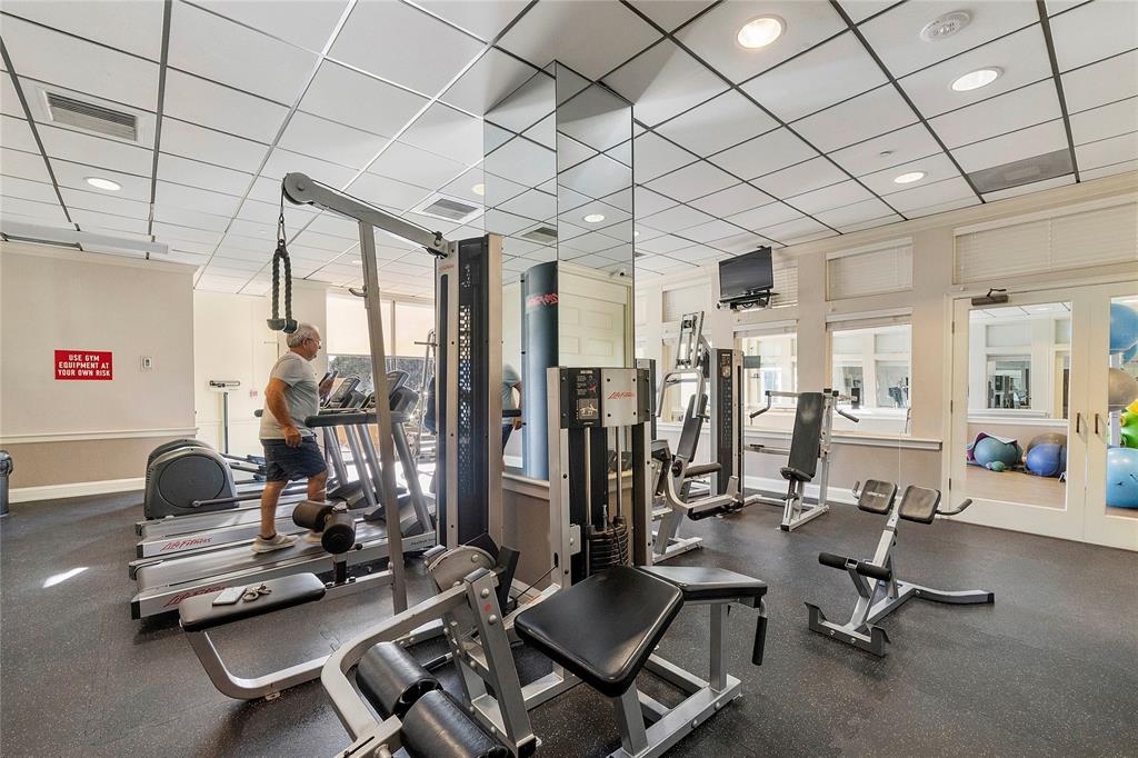1900 South Ocean Boulevard, Unit 4H Pompano Beach, FL 33062 - Photo 25 of 35 a view of a room with gym equipment