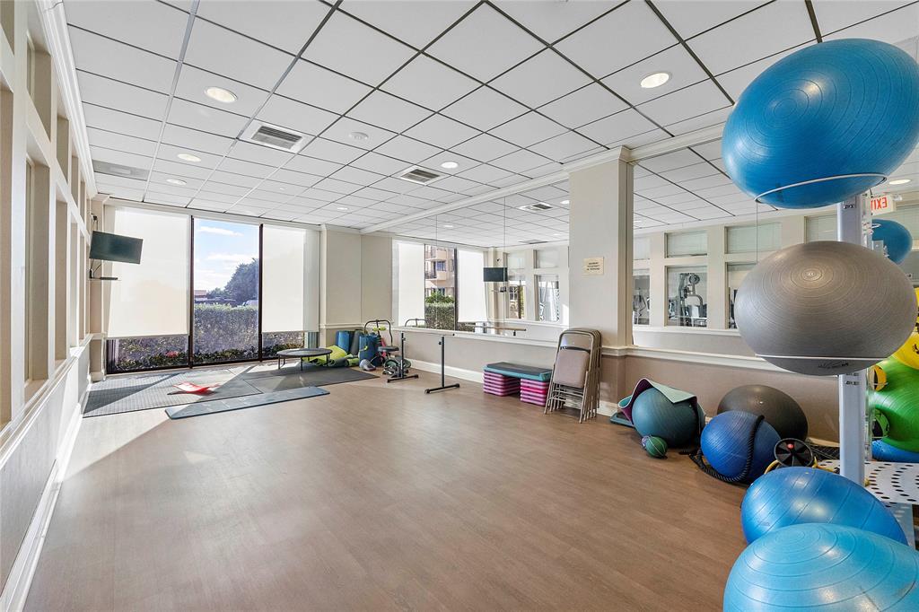 1900 South Ocean Boulevard, Unit 4H Pompano Beach, FL 33062 - Photo 26 of 35 a view of a room with gym equipment