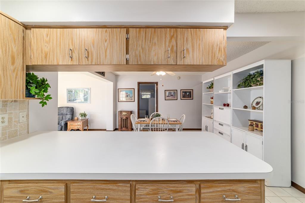 8530 Southwest 92 Street, Unit D Ocala, FL 34481 - Photo 14 of 42 a living room with furniture and large window