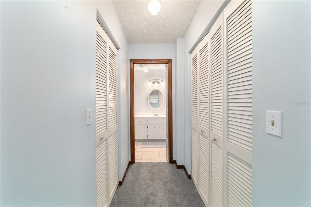 8530 Southwest 92 Street, Unit D Ocala, FL 34481 - Photo 19 of 42 a view of a bathroom from a hallway