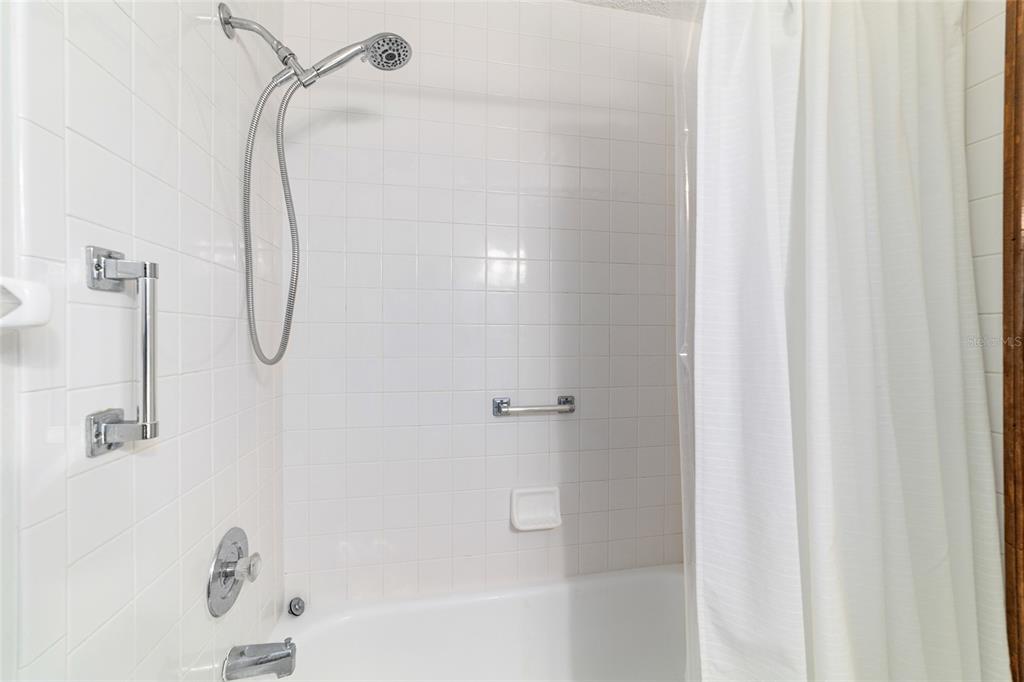 8530 Southwest 92 Street, Unit D Ocala, FL 34481 - Photo 24 of 42 a bathroom with a bath tub