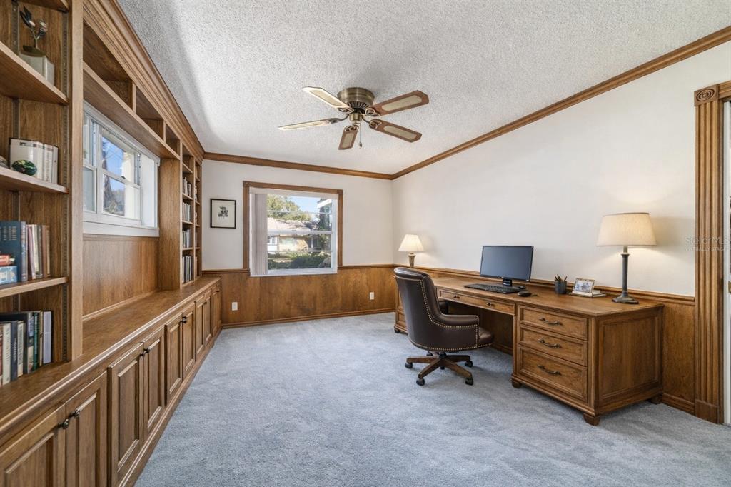 8530 Southwest 92 Street, Unit D Ocala, FL 34481 - Photo 7 of 42 a view of a workspace with furniture and a window