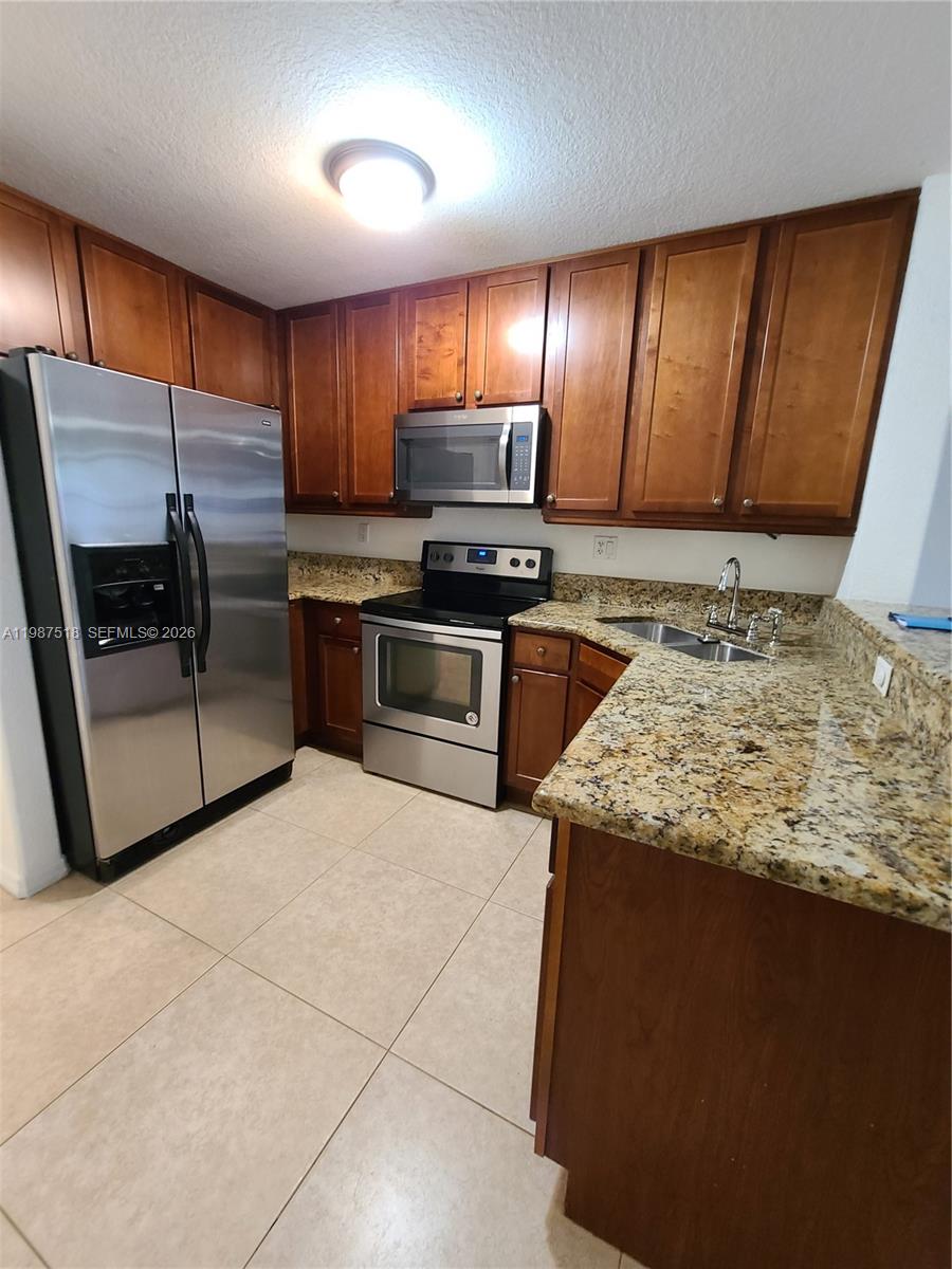 3071 Riverside Drive, Unit 11 Coral Springs, FL 33065 - Photo 3 of 15