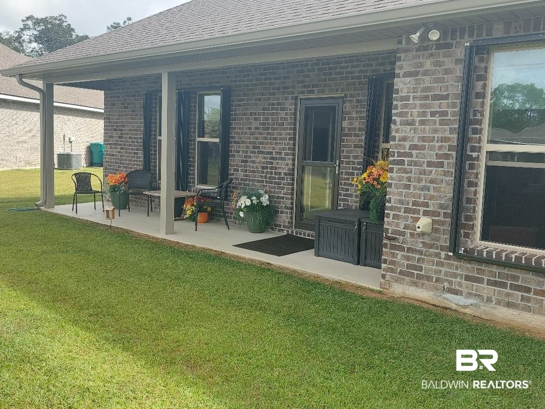 1271 Surrey Loop Foley, AL 36535 - Photo 3 of 23 Back Patio