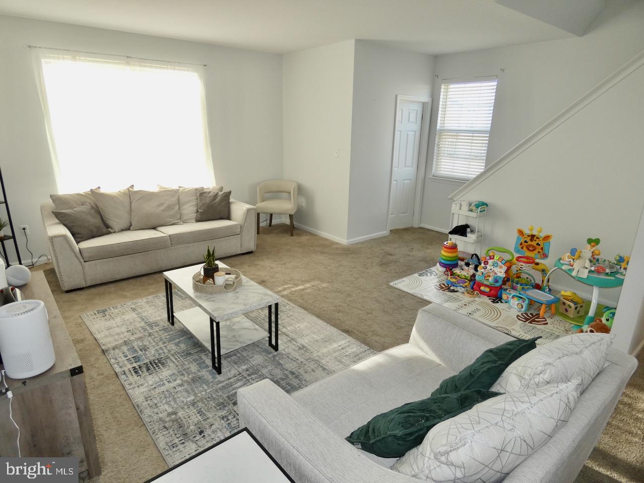 15 Wicklow Road Bear, DE 19701 - Photo 11 of 53 a living room with furniture and a wooden floor