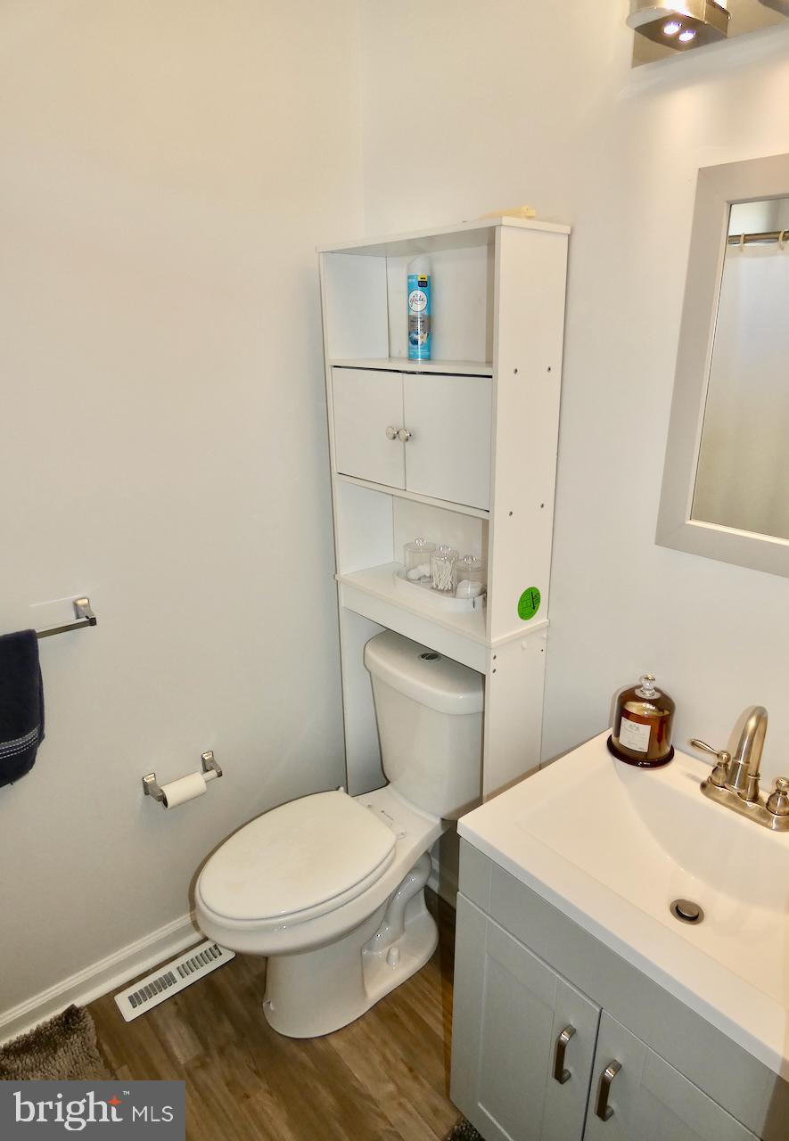 15 Wicklow Road Bear, DE 19701 - Photo 29 of 53 a white toilet sitting next to a bathroom sink