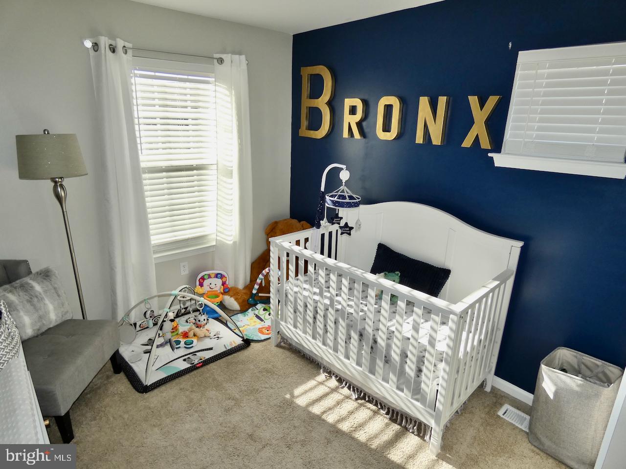 15 Wicklow Road Bear, DE 19701 - Photo 36 of 53 a bedroom with furniture and a window