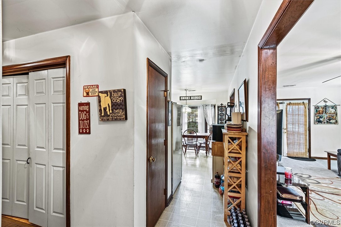 7830 Brightridge Road Chesterfield, VA 23832 - Photo 4 of 18 a view of a hallway with wooden floor and windows