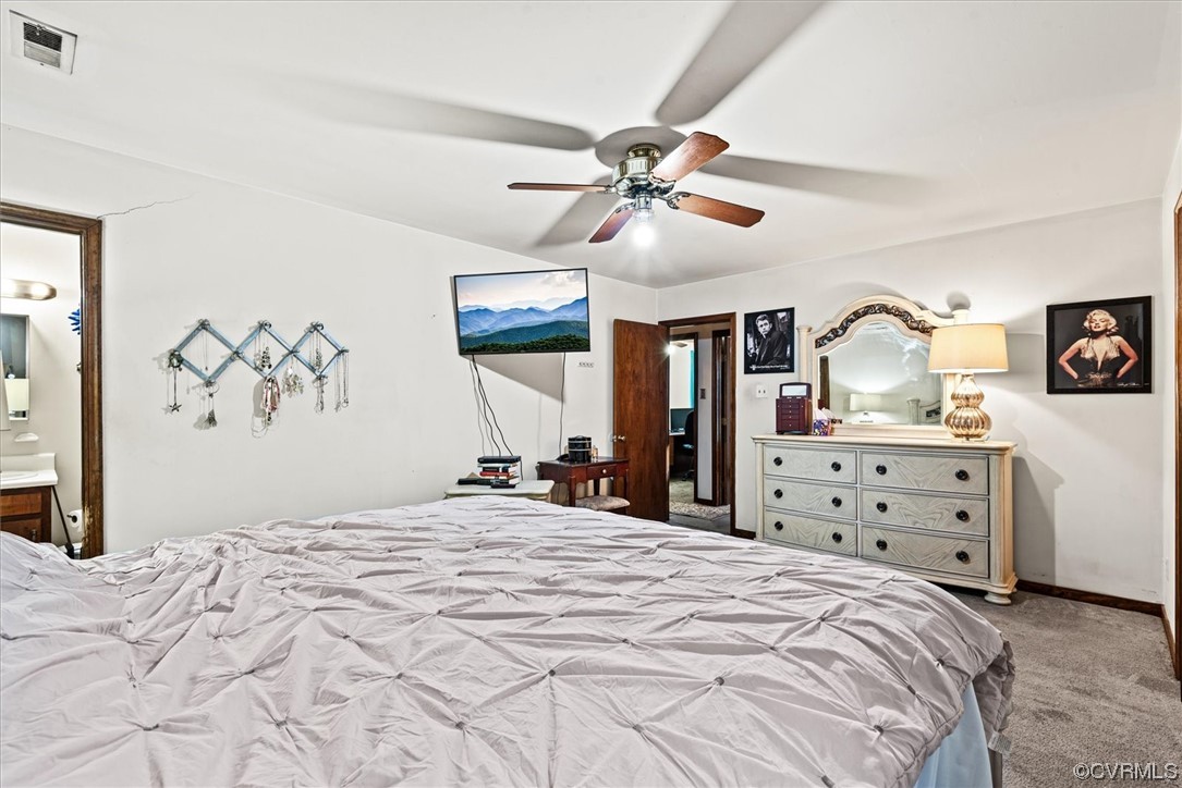 7830 Brightridge Road Chesterfield, VA 23832 - Photo 10 of 18 a bedroom with a bed and ceiling fan