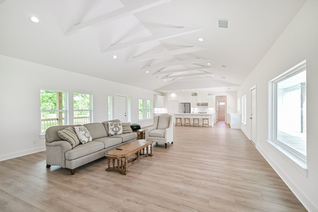4294 Brazos River Road, Unit CR400 Freeport, TX 77541 - Photo 19 of 50 a living room with furniture and a large window