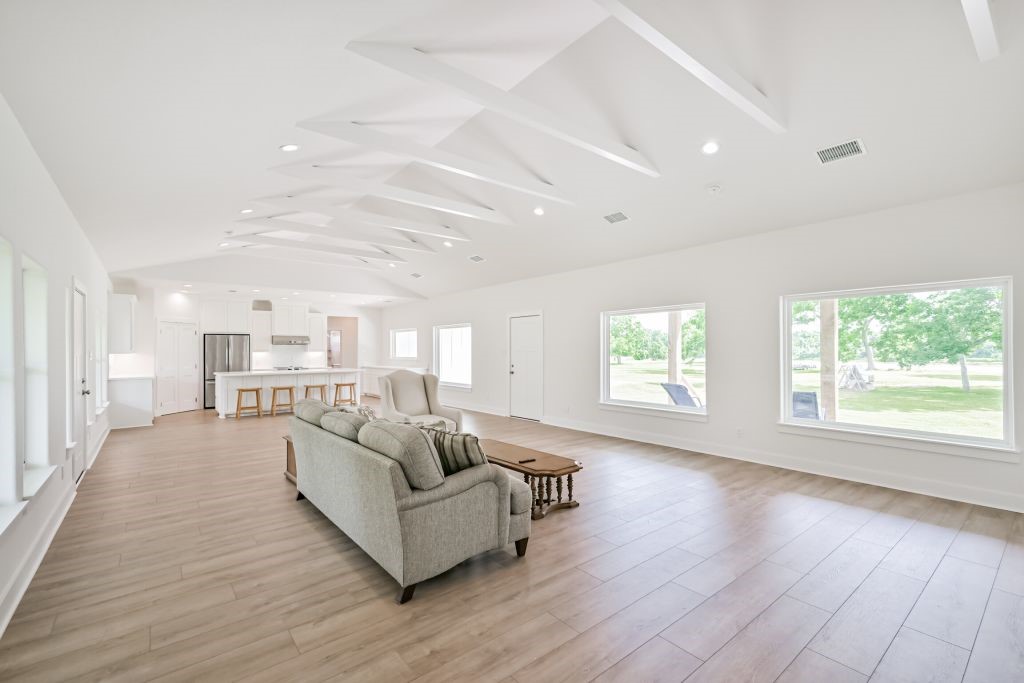 4294 Brazos River Road, Unit CR400 Freeport, TX 77541 - Photo 21 of 50 a living room with furniture and a large window