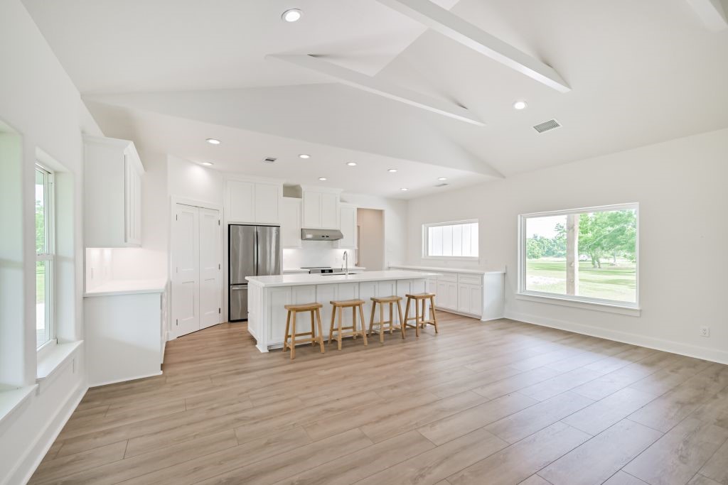 4294 Brazos River Road, Unit CR400 Freeport, TX 77541 - Photo 23 of 50 a view of kitchen with furniture and wooden floor