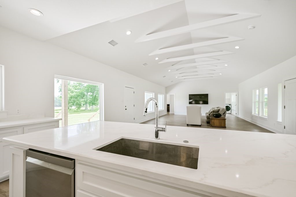 4294 Brazos River Road, Unit CR400 Freeport, TX 77541 - Photo 29 of 50 a kitchen with a sink and a large window