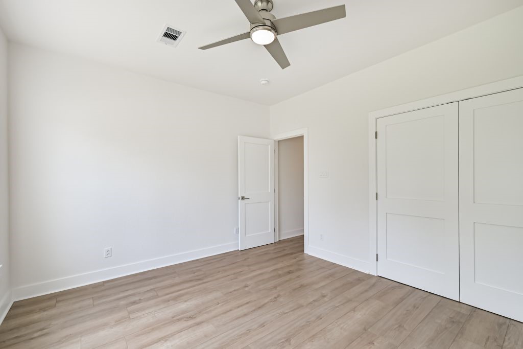 4294 Brazos River Road, Unit CR400 Freeport, TX 77541 - Photo 34 of 50 wooden floor in an empty room