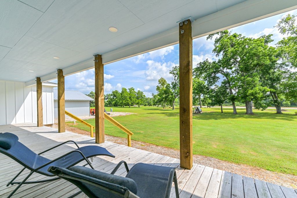 4294 Brazos River Road, Unit CR400 Freeport, TX 77541 - Photo 45 of 50 a view of a balcony with lake view and a ocean view