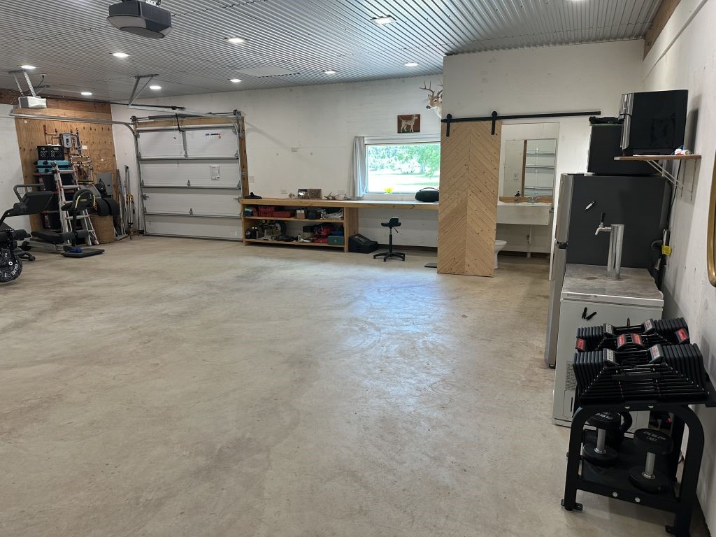 4294 Brazos River Road, Unit CR400 Freeport, TX 77541 - Photo 48 of 50 a view of a room with gym equipment and a window