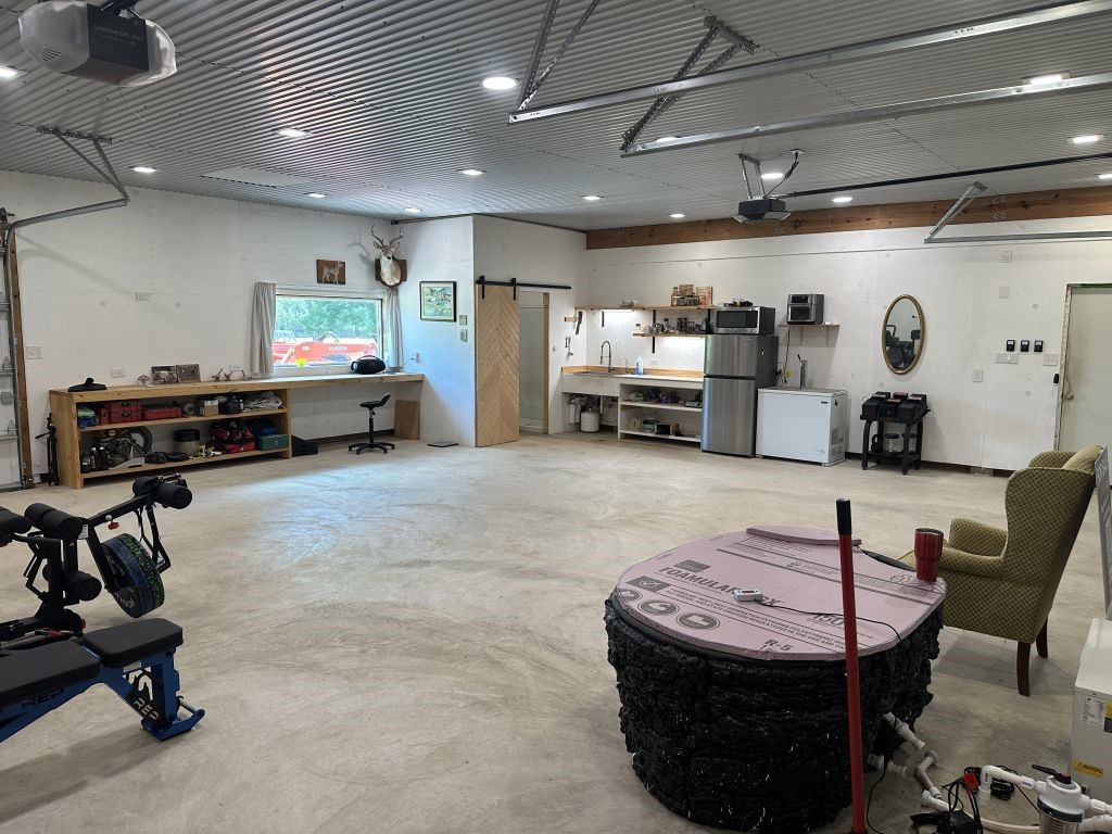 4294 Brazos River Road, Unit CR400 Freeport, TX 77541 - Photo 49 of 50 a living room with furniture and a flat screen tv